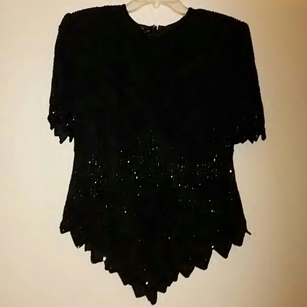 Beaded black evening blouse.