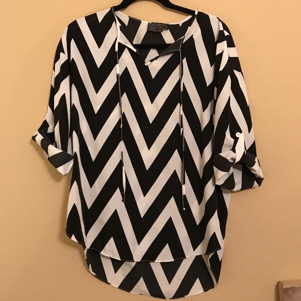 Black and white zig zag striped blouse.