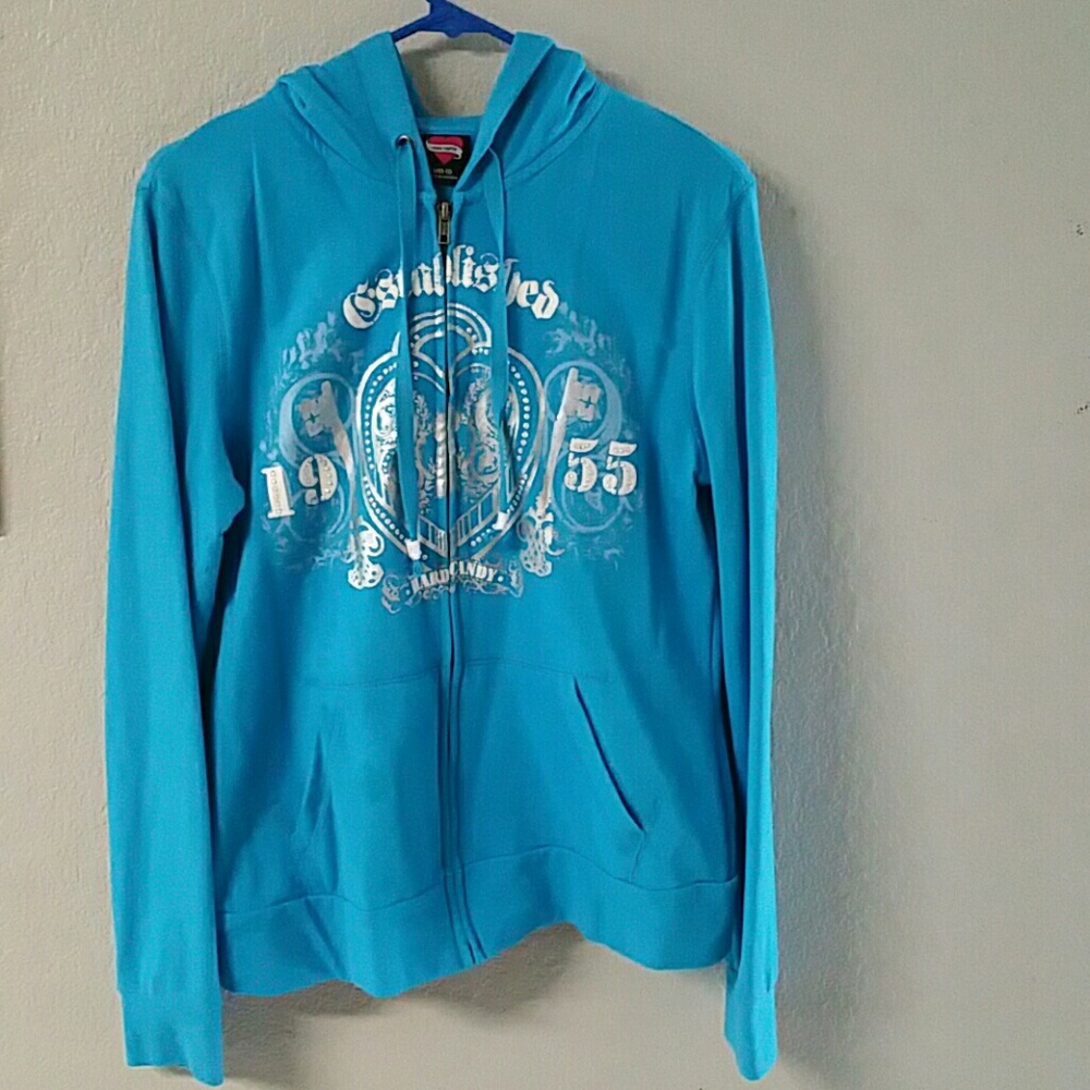 Jogging suit with tapered legs zipper at bottom