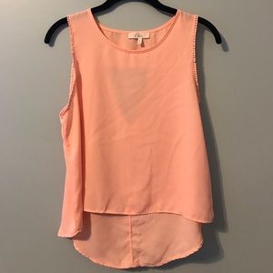 Peach flowy tank top.