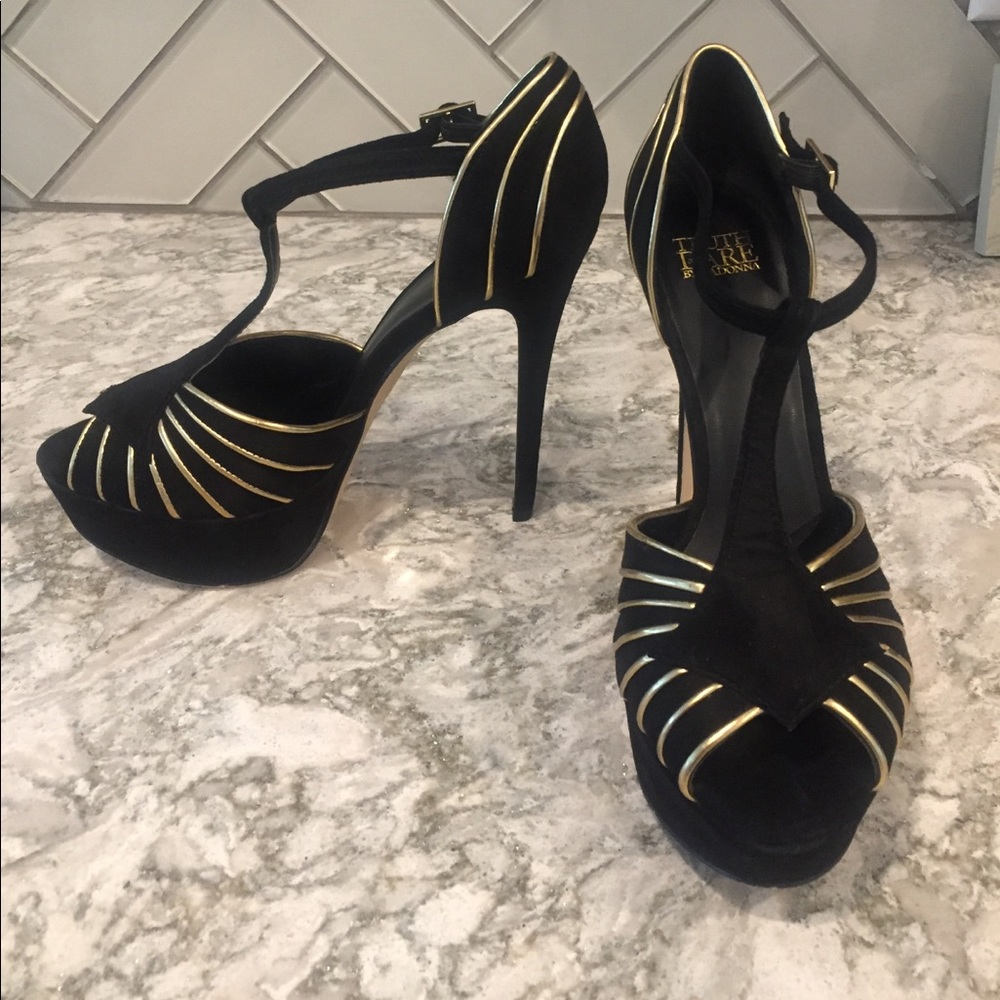 ✨ Black and gold platform stilettos by Madonna ✨