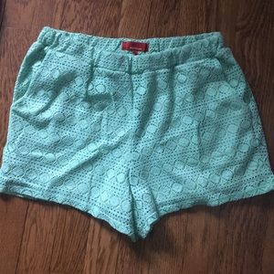 Turquoise crochet shorts with pockets