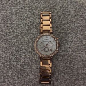 Rose gold women's watch with crystal accents