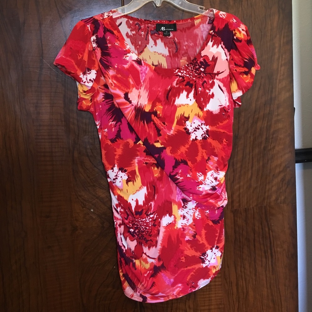 Gathered floral shirt.