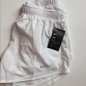 Never worn Nike Size M Dri-fit running shorts