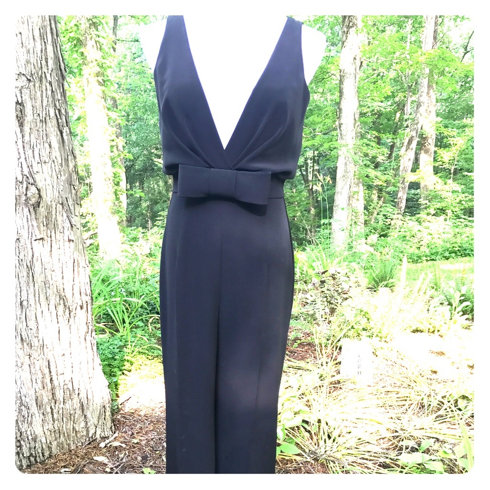 Black, tuxedo style jumpsuit.  Size 8.