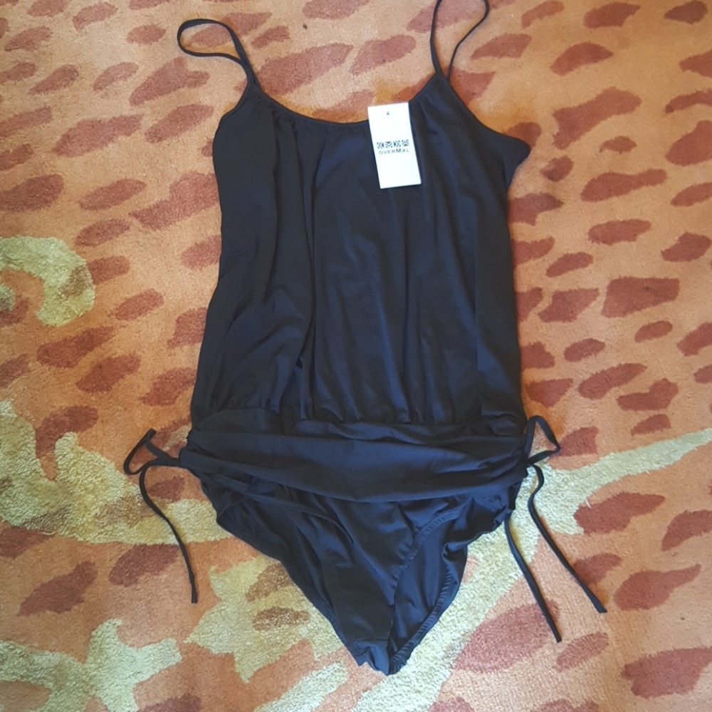 Black one piece with hip level side drawstring
