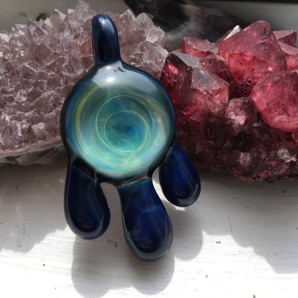 Glass blown pendant.