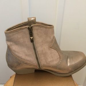 Golden shimmer tan ankle high cowboy boots.