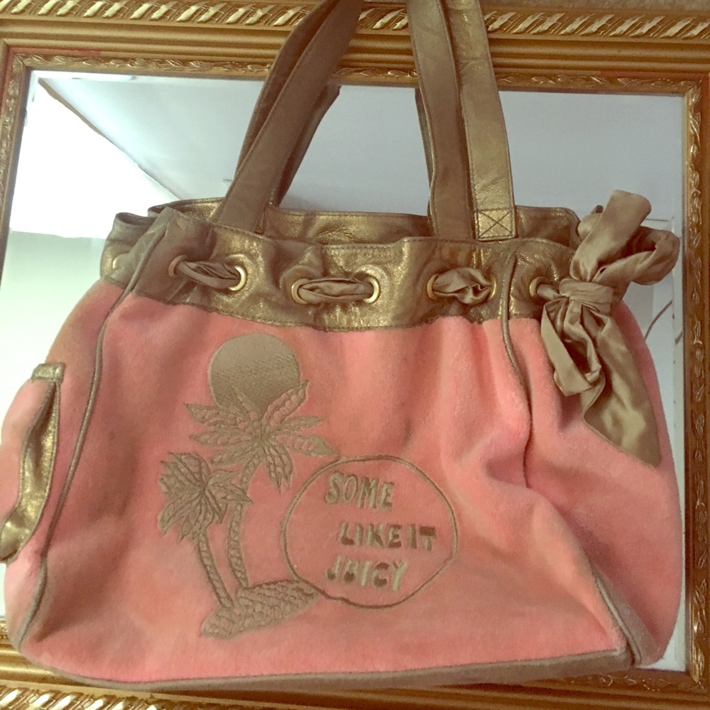 A pink and gold juicy bag