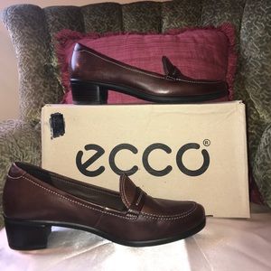 Brown leather loafers.