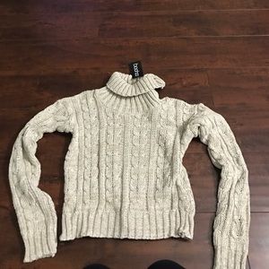 Cropped cable knit turtle neck sweater