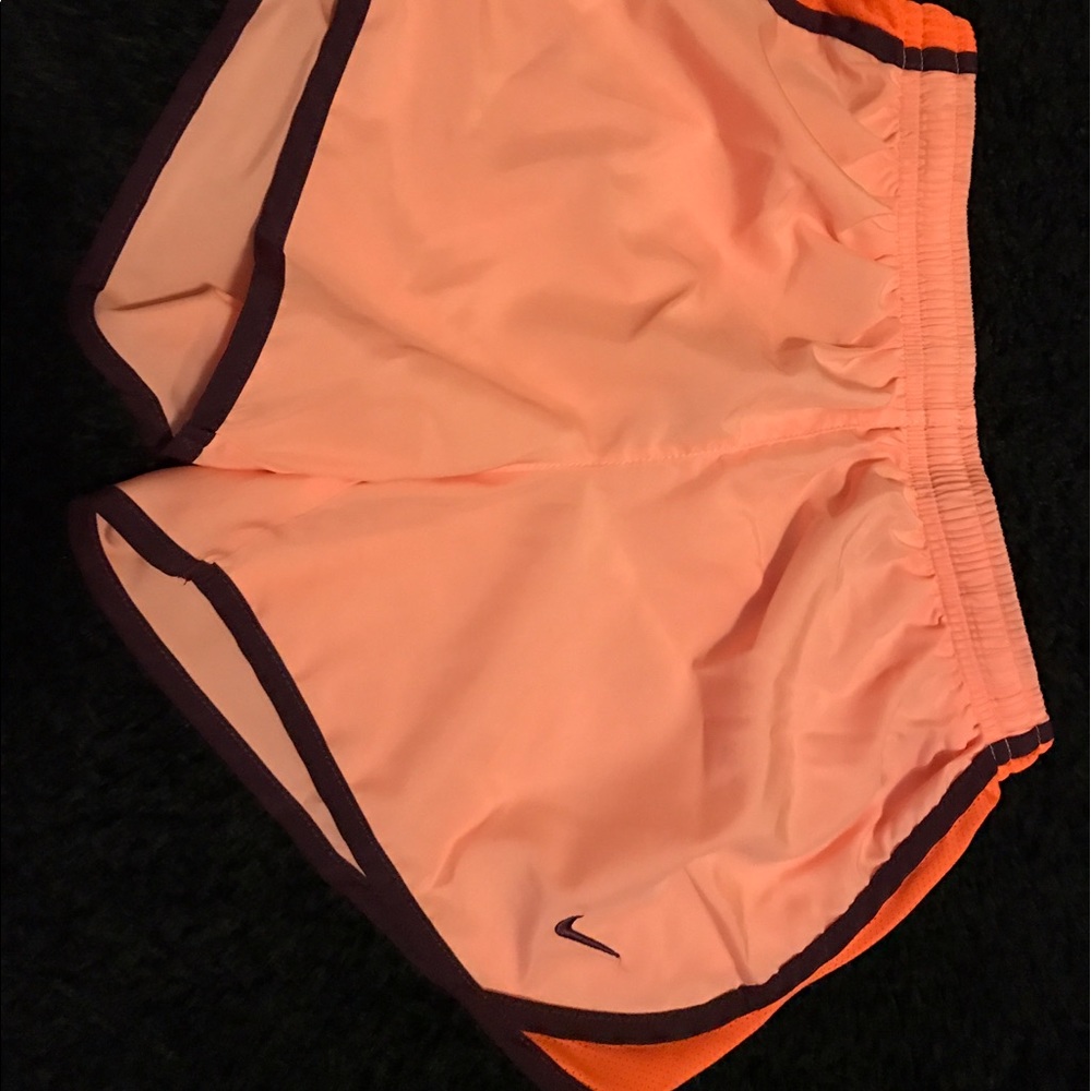 Orange Nike shorts
