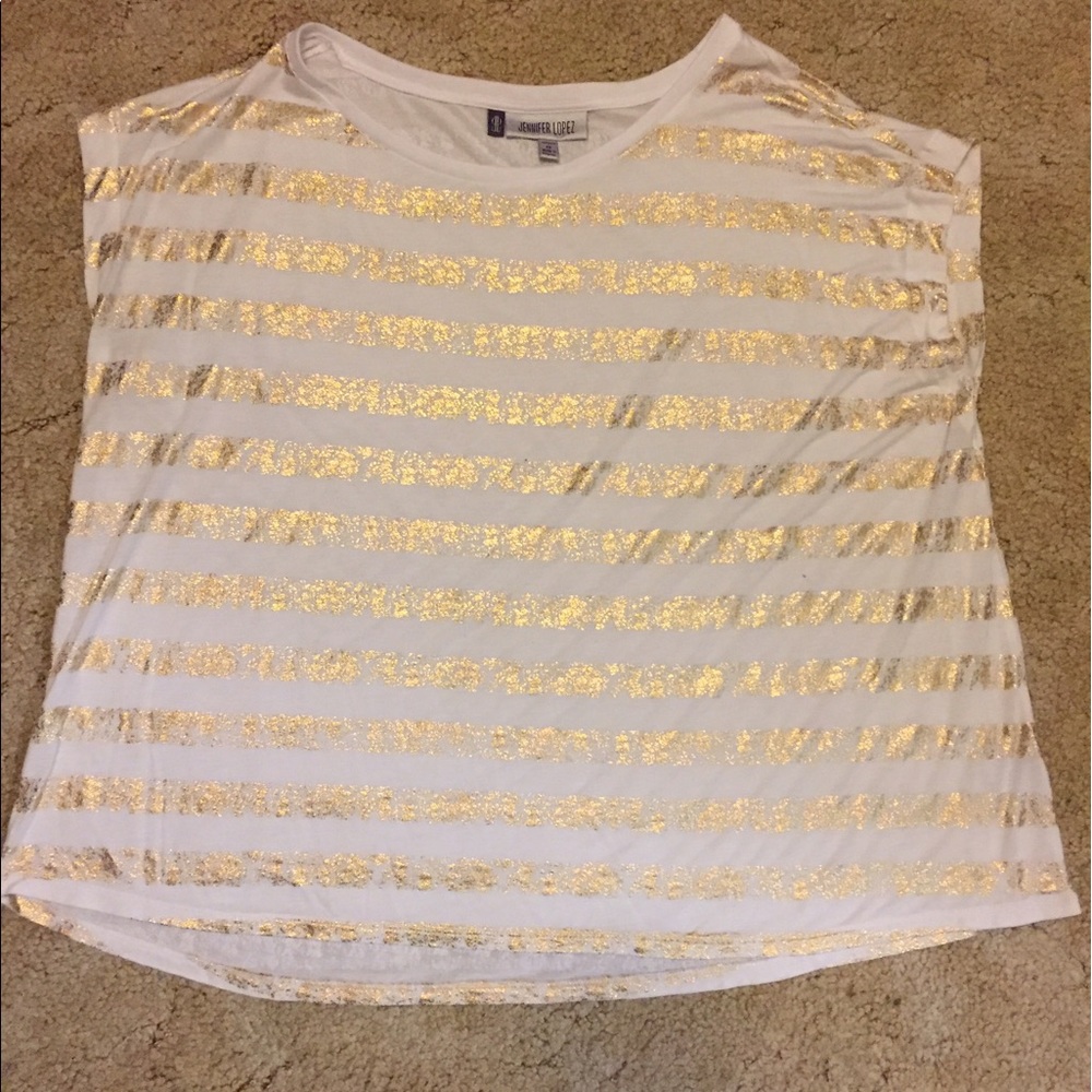 Jennifer Lopez gold and white shirt