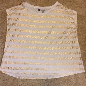 Jennifer Lopez gold and white shirt