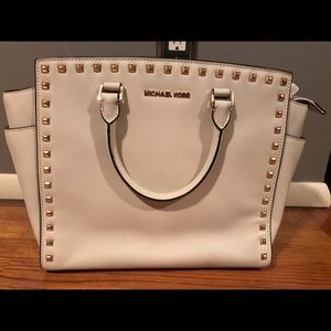 Michael Kors white, gold studded bag.