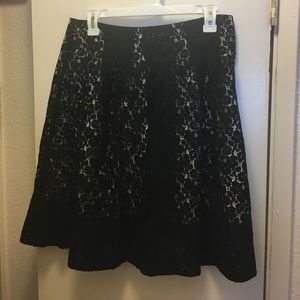 NWOT Beautiful black lace skirt. Size 8p.