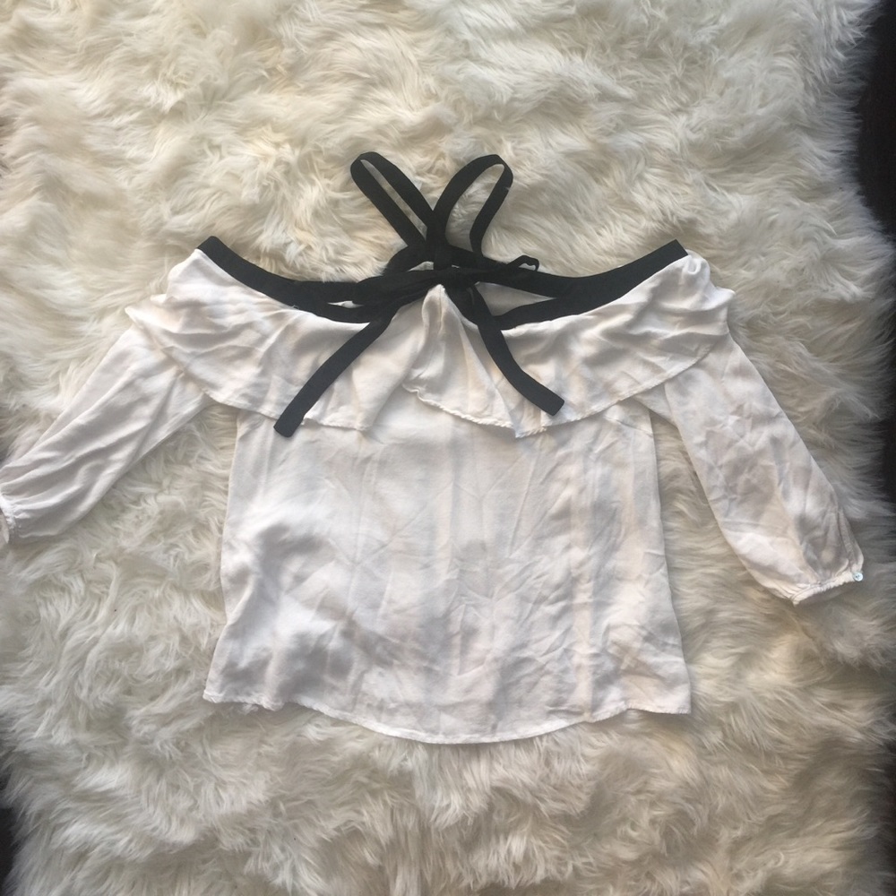 Never wornBlack and White off shoulder blouse.