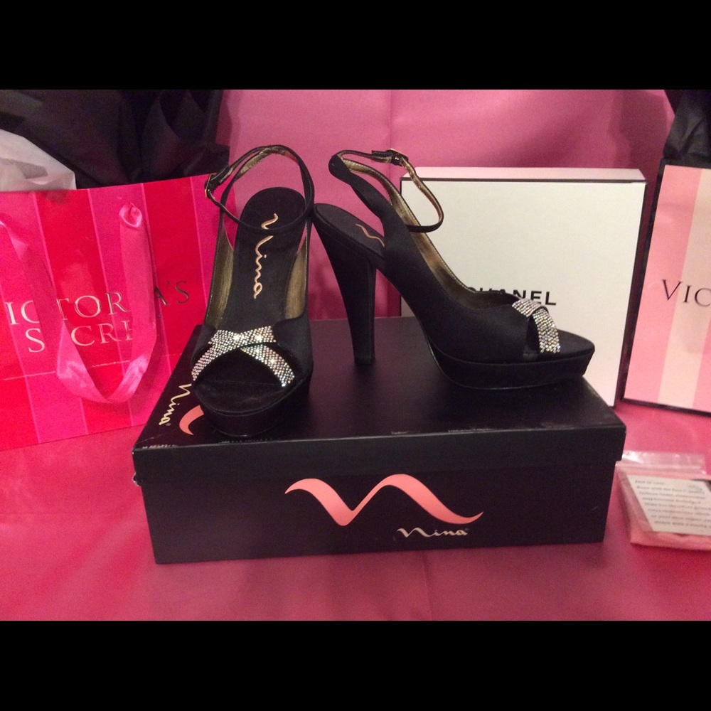 Brand New. BLACK NINA shoes with leather bottoms.