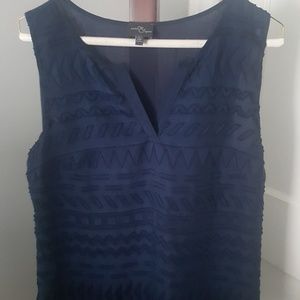 Sleeveless split neck tops