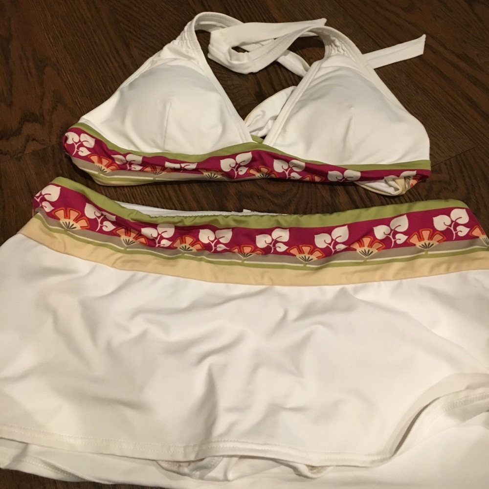 Two piece halter bikini with swim skirt.
