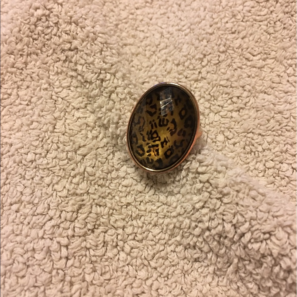 Golden with tiger print on oval shape!