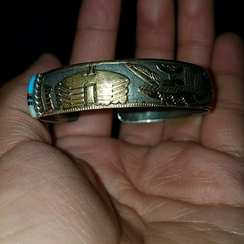 Sterling silver story telling braclet.