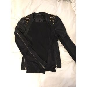 Black leather jacket with gold studs