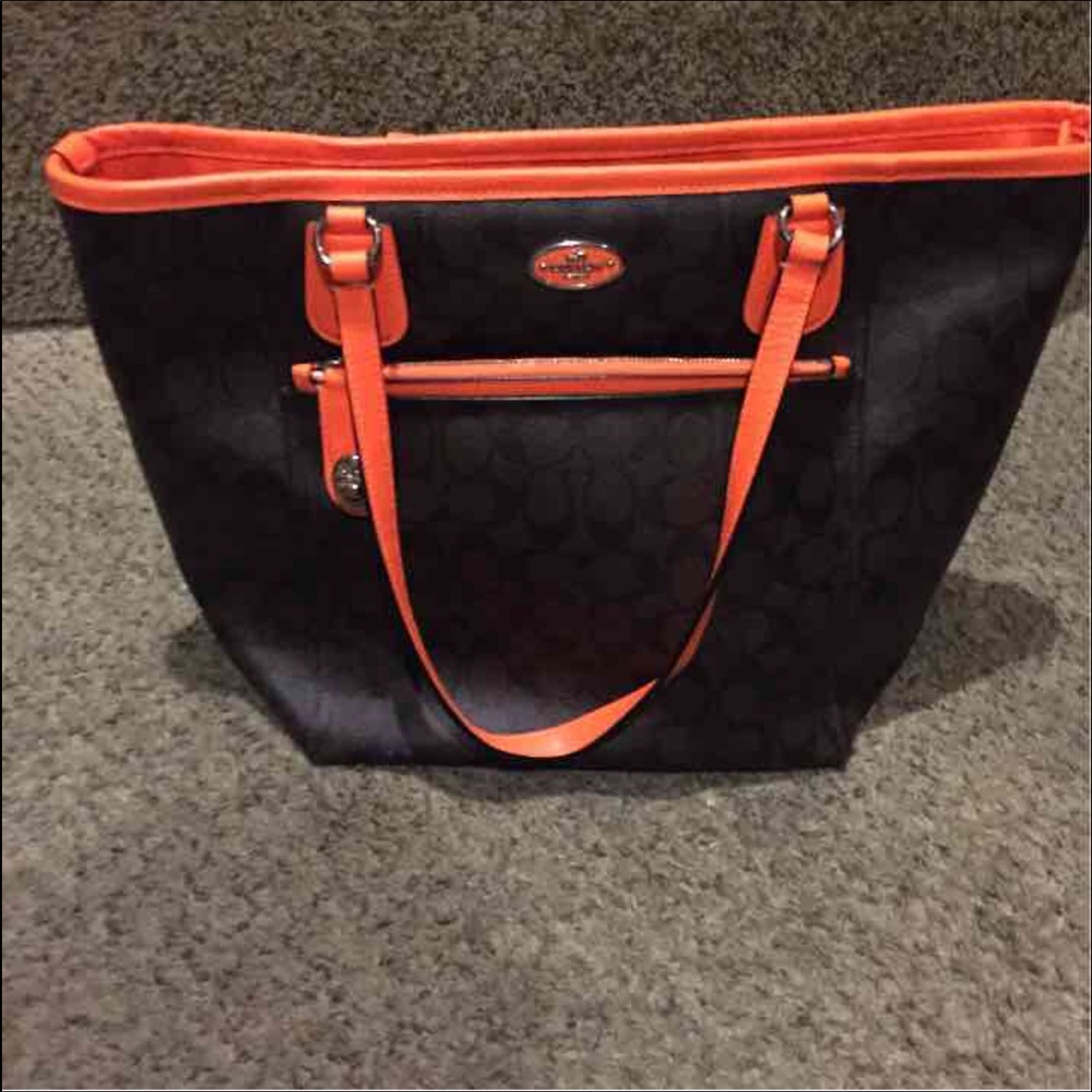 Coach neon orange tote and matching wallet