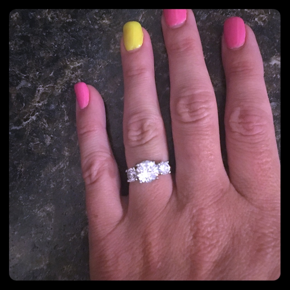 Very realistic CZ three stone ring
