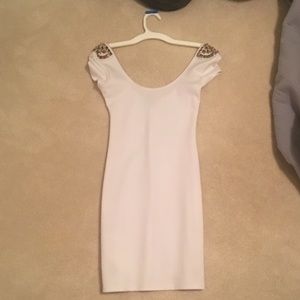 White dress with gold studs