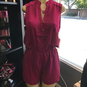 New Burgundy shorts romper.. Size: Small