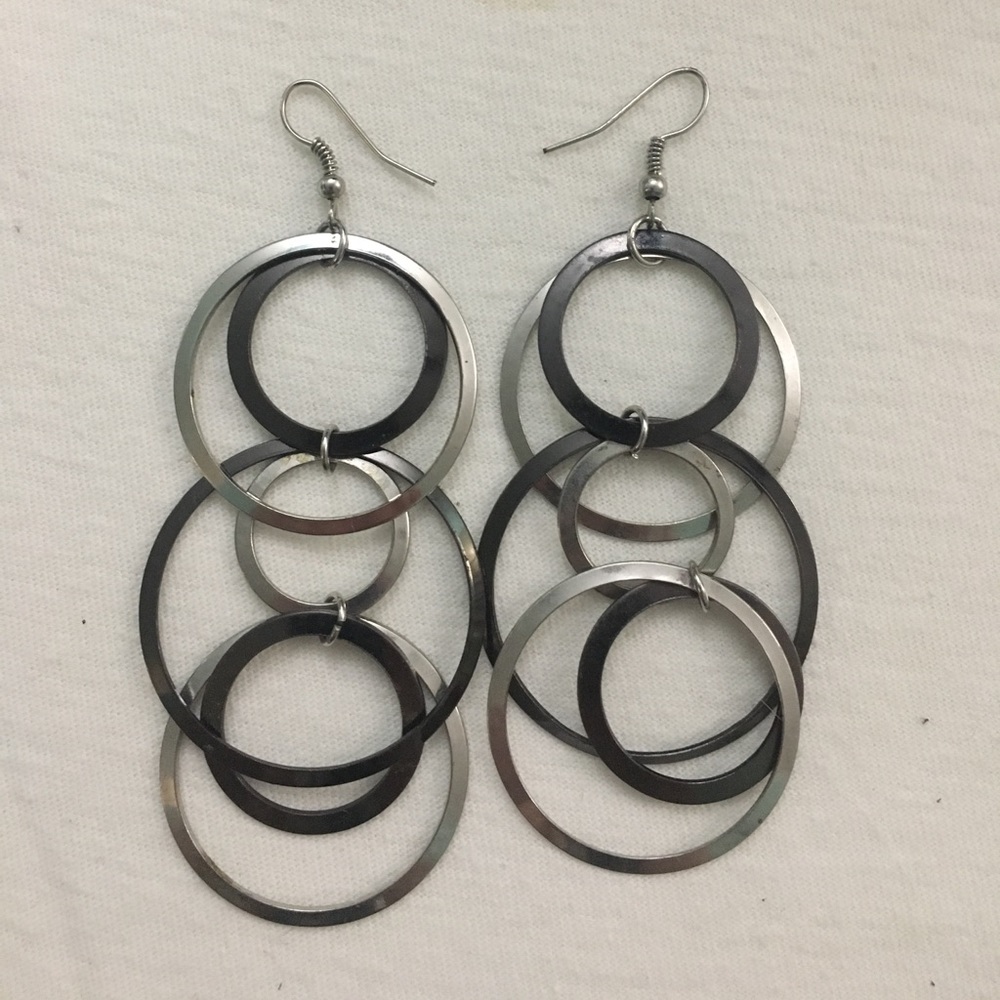 Two tone silver dangle earrings.