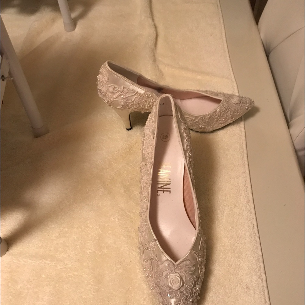White cloth, appliquéd shoes by Jeanine; S: 8 1/2