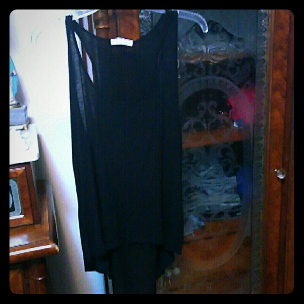 Black top with see through sheer in back