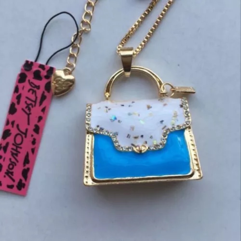 Icing on blue purse necklace