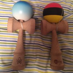 Two Kendamas one is a cushion and one is silk