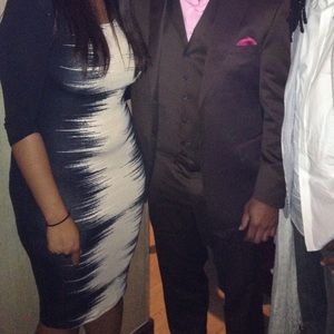 Polyester dress with half arm length sleeves.