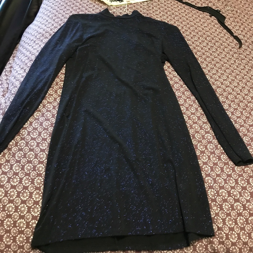 Blue sparkly long sleeved dress w/back out detail.