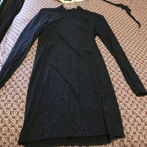 Blue sparkly long sleeved dress w/back out detail.