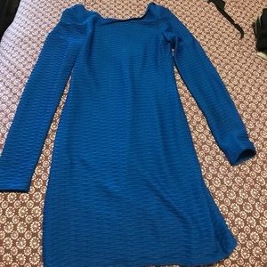 Low back royal blue dress with ridges detail.