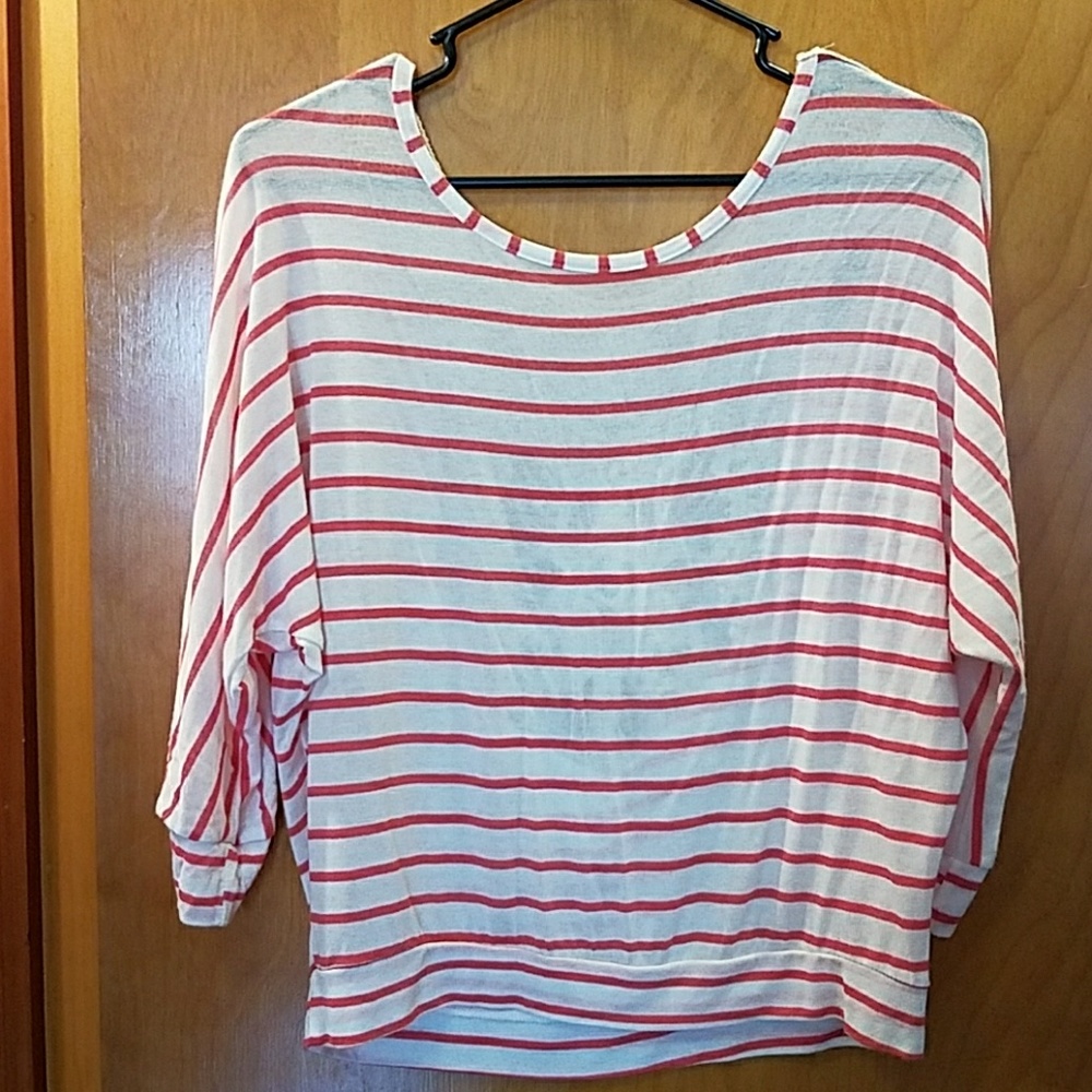 3/4 sleeve coral colored sweater.