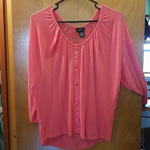 Coral colored 3/4 sleeve blouse.