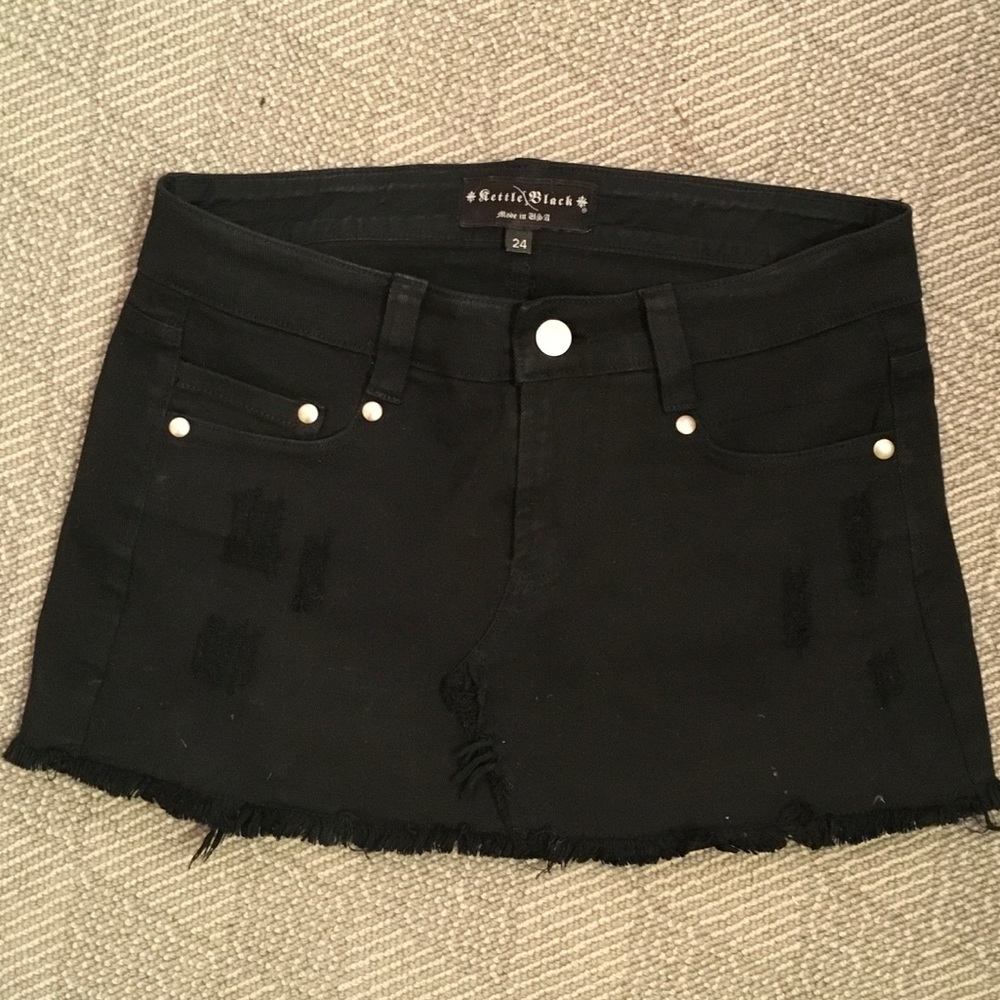 Adorable distressed black mini skirt!