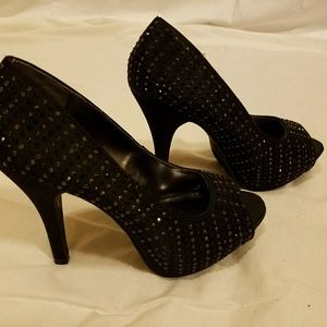 Black Satin peep toe heel with stones.