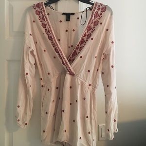Cream long sleeve romper with maroon detail