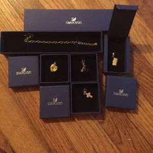 Swarovski charm bracelet and 4 charms