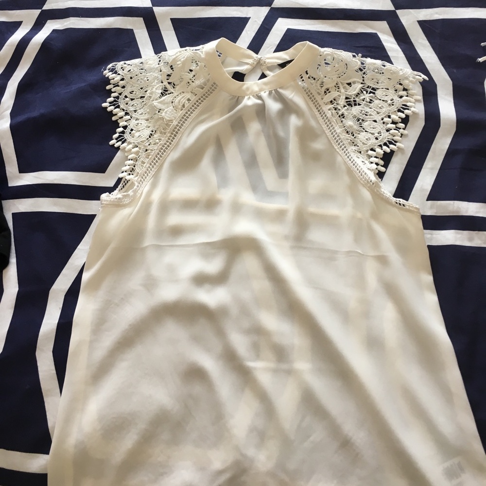 Beautiful lace sleeve top. Size XS from Express