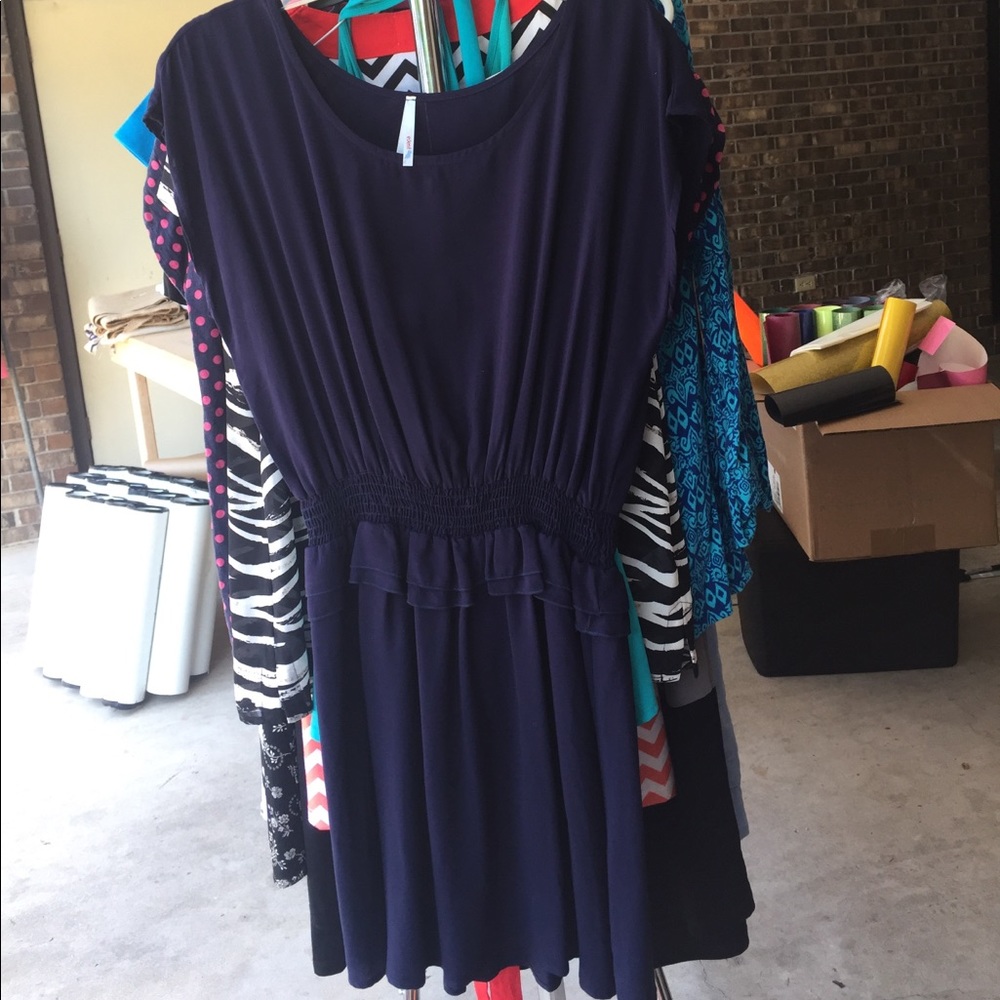 Navy dress with elastic waist.