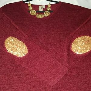 Long burgundy sweater with gold elbow patches